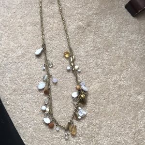 Long strand statement necklace